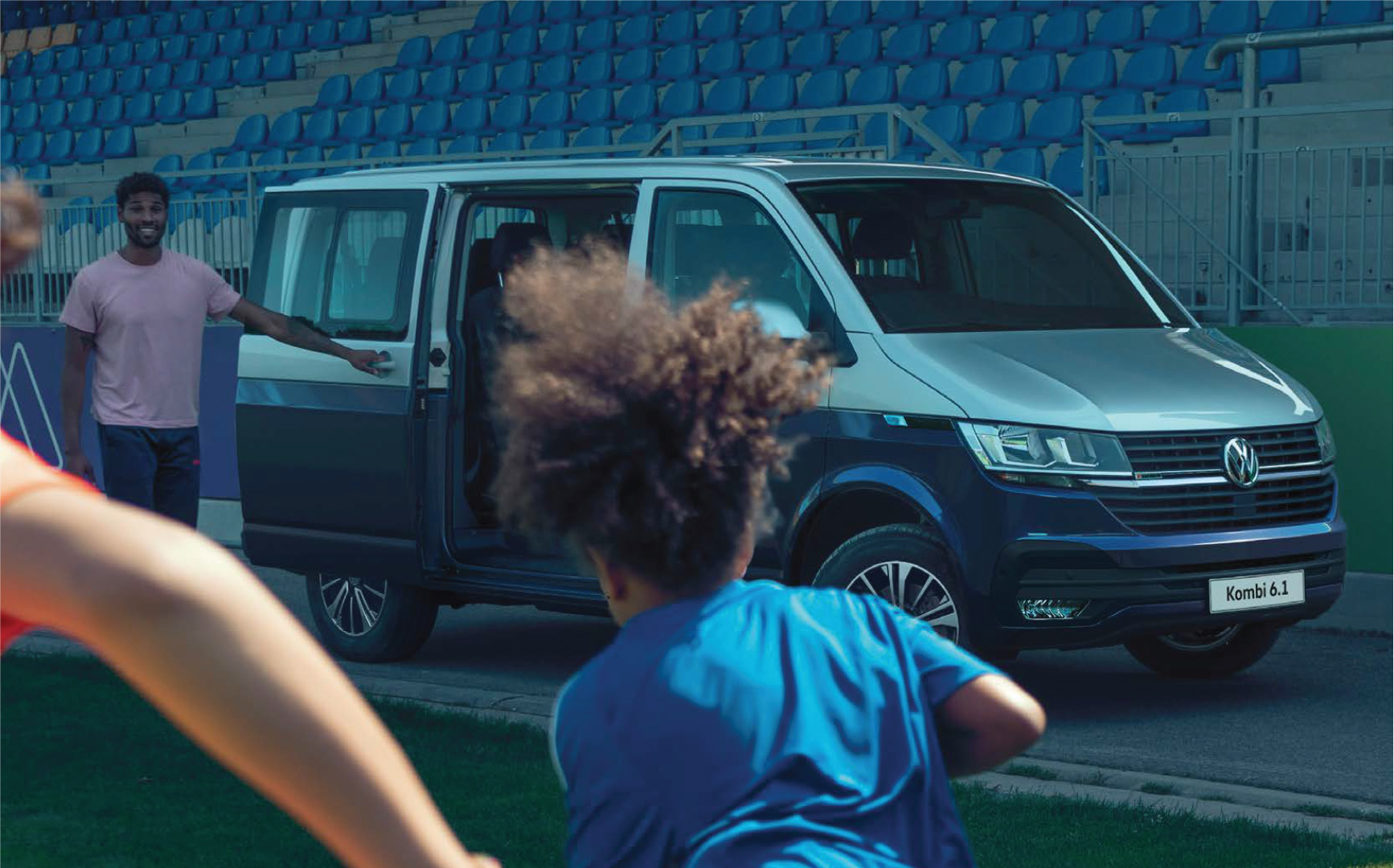 VW Kombi parked in stadium